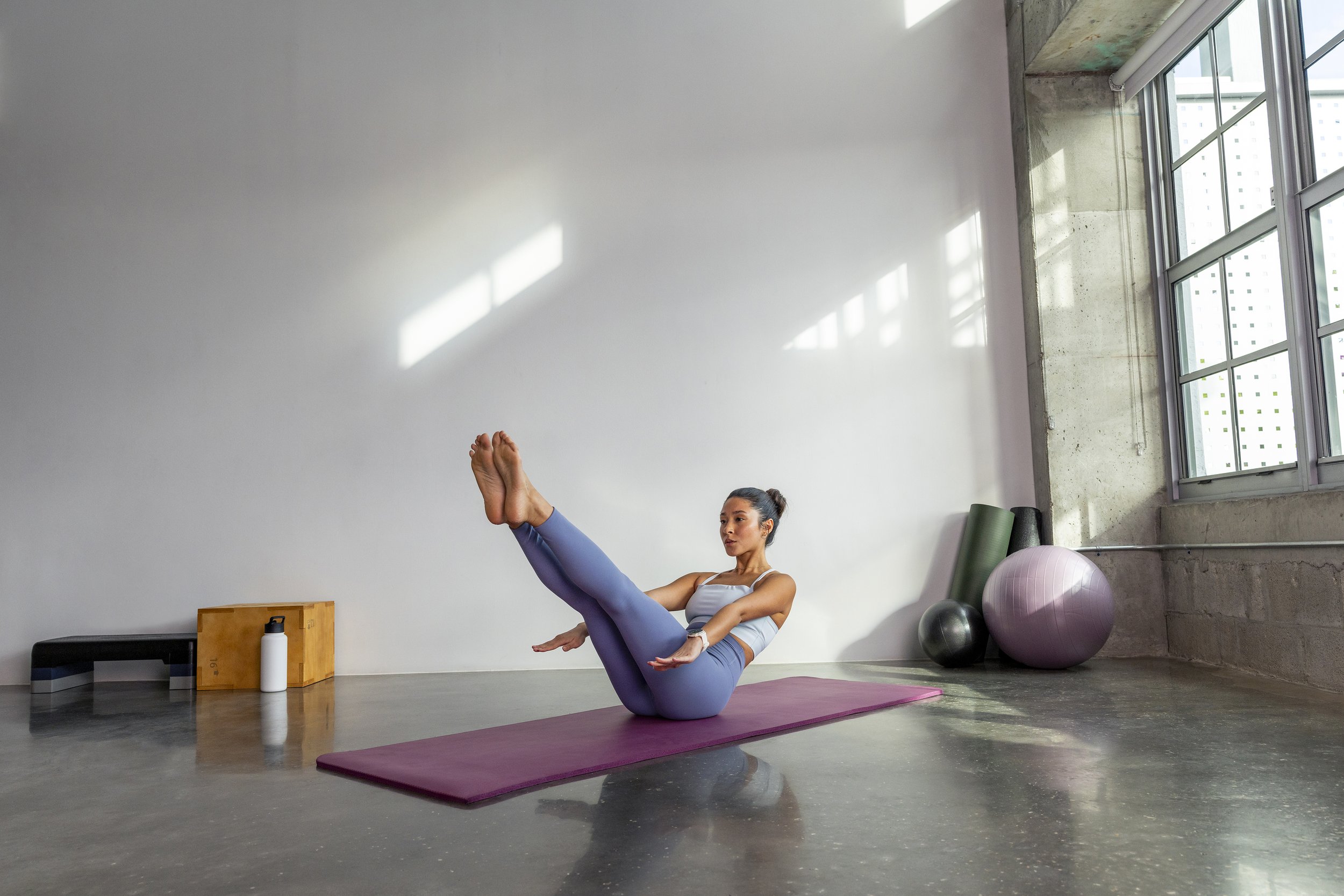 Woman cast for a Garmin pilates studio campaign
